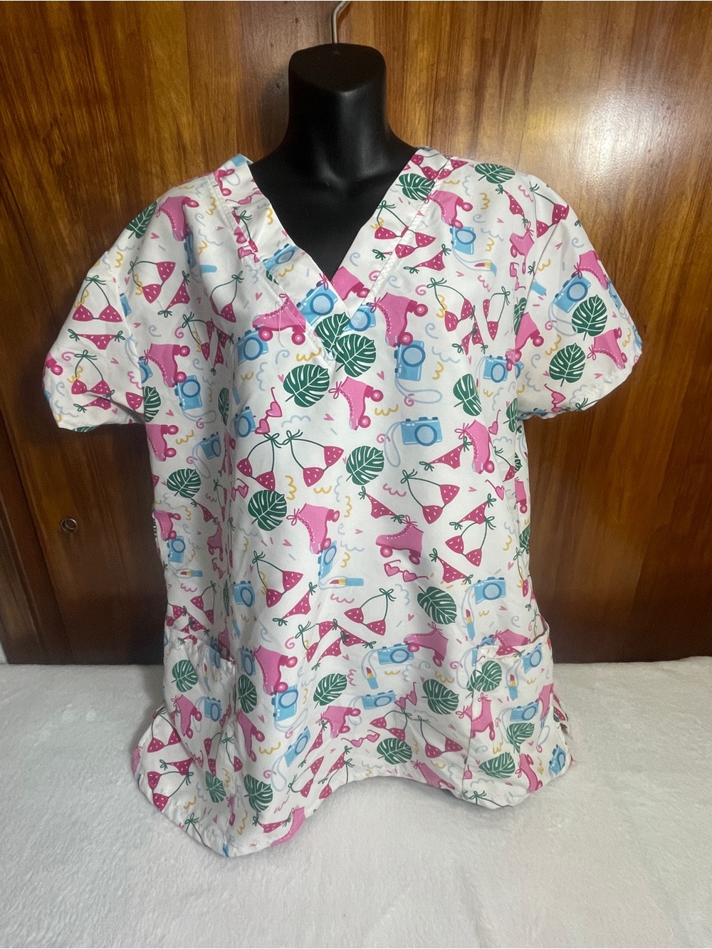 Cassandra O woman’s XL white pattern medical scrub top